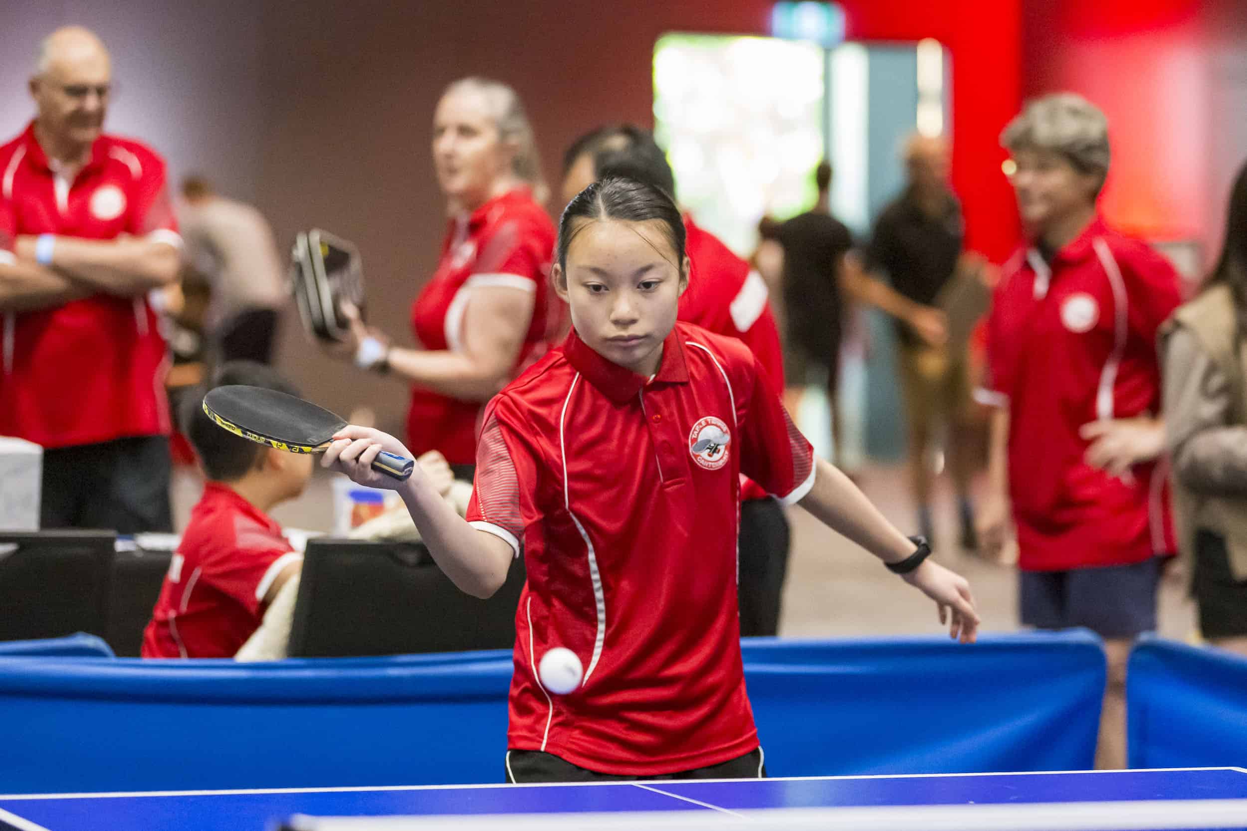 Young asian girl playing table tennis.