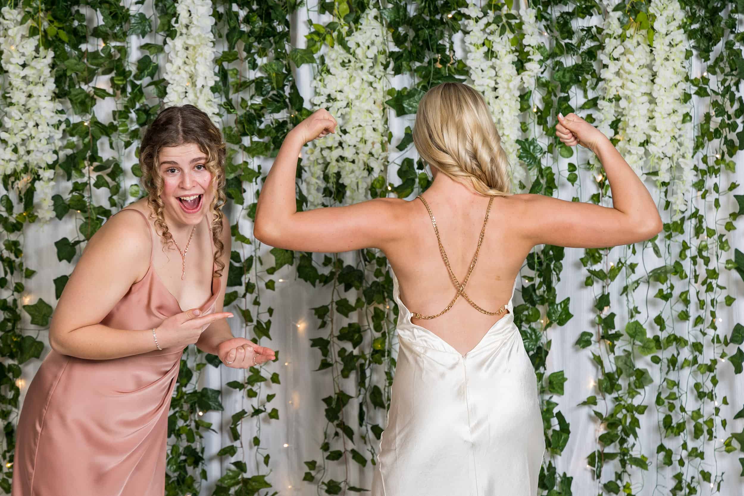 Muscely girl poses for friend at school ball!