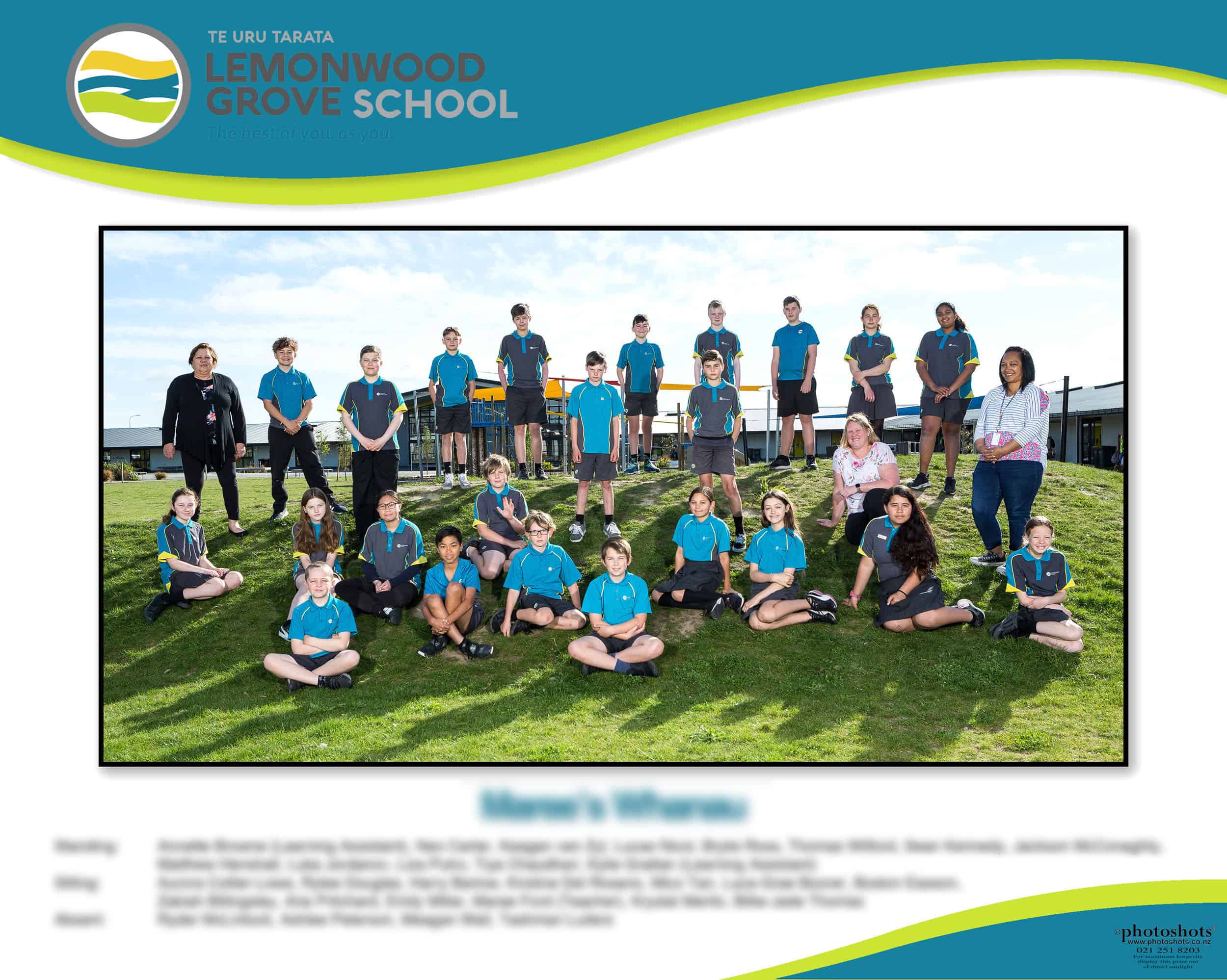 Candid arrangement of a primry class group on a low mound at Lemonwood Grove School, Rolleston.