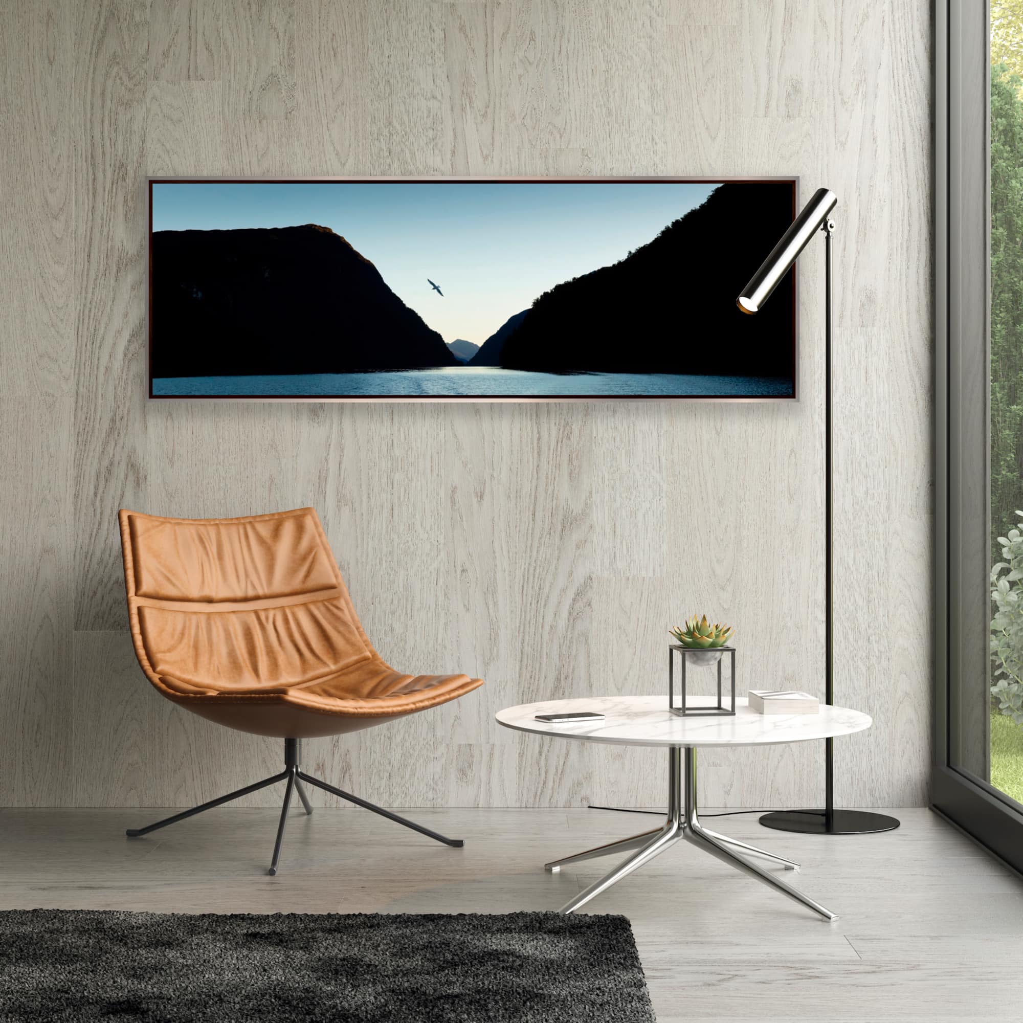 Panorama print of Fiordland displayed on a lounge room wall, taken by Christchurch photographer Tony Stewart.